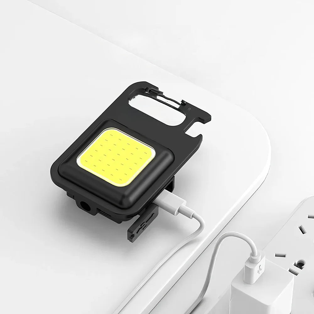 Mini linterna LED multifuncional recargable por USB