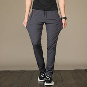 2021 autumn and winter men's casual pants young Korean version of the Korean version of the body and small feet pants student movement pencil pants tide - Blue Force Sports